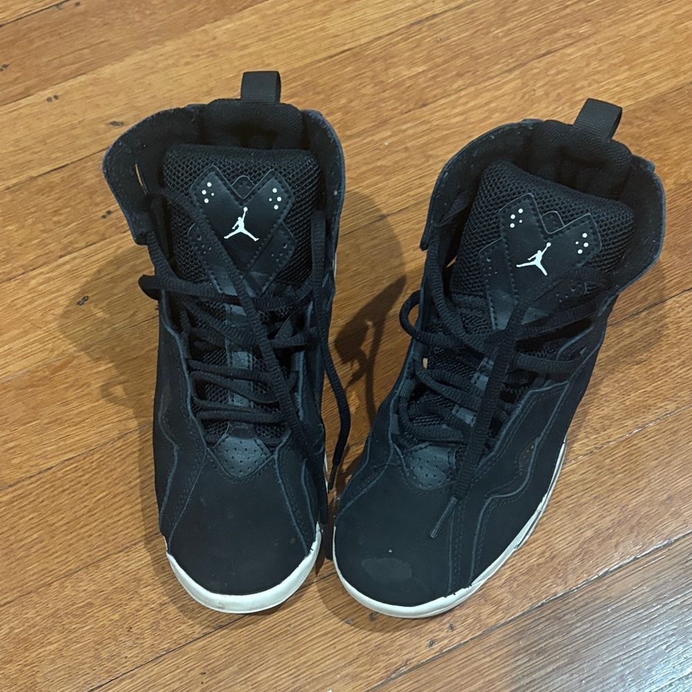 Black High-Top Sneakers with White Accents